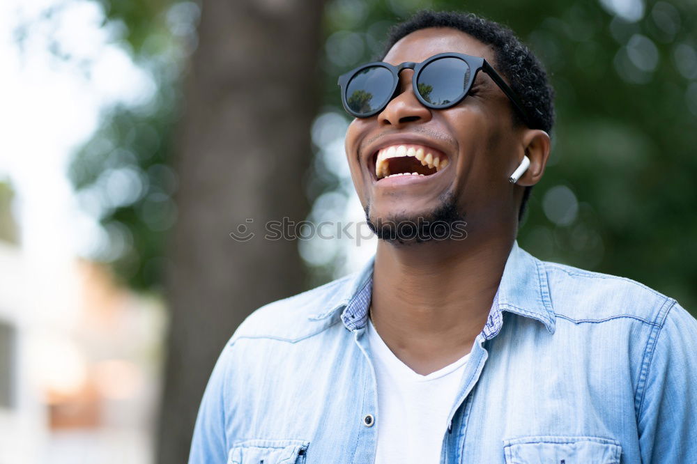 Similar – Image, Stock Photo Afro young man using mobile phone.