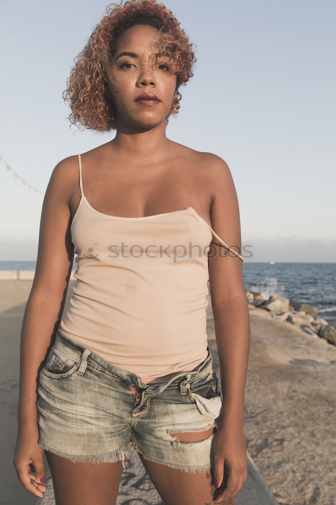 Similar – Confident black woman in sunlight