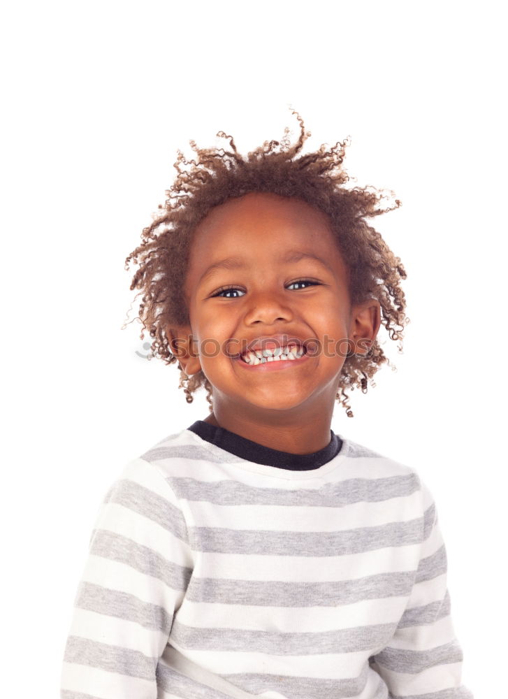 Similar – Cute male toddler laying on bed looking at camera