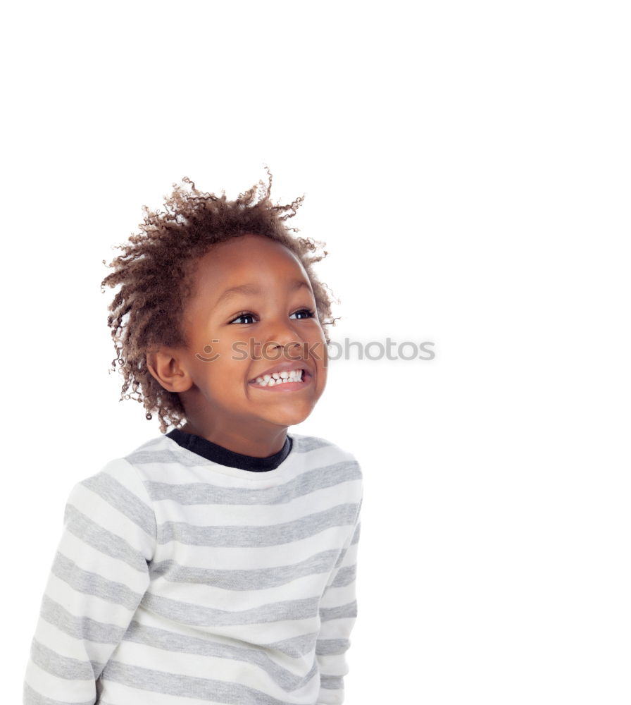 Similar – Cute male toddler laying on bed looking at camera