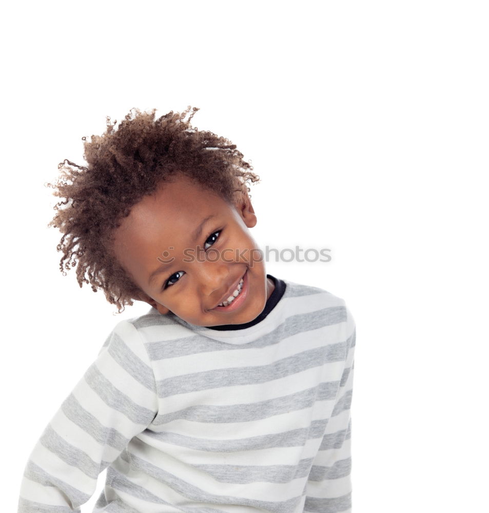 Similar – Cute male toddler laying on bed looking at camera