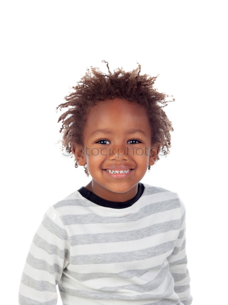 Similar – Cute male toddler laying on bed looking at camera