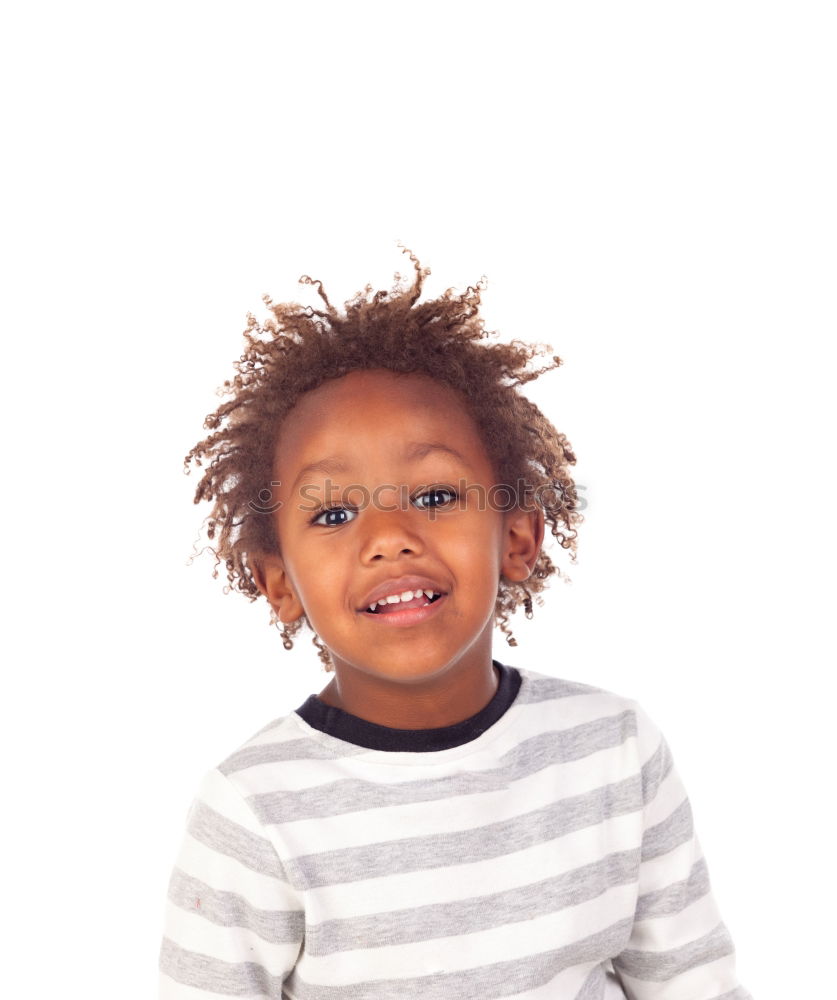 Similar – Cute male toddler laying on bed looking at camera