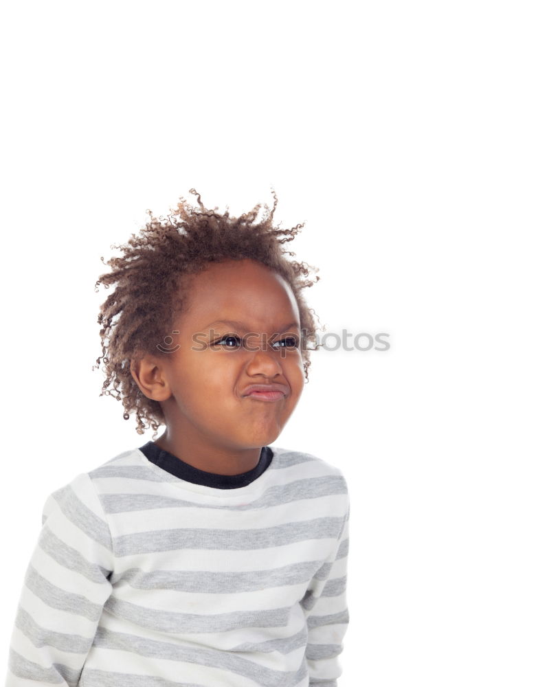 Similar – Cute male toddler laying on bed looking at camera