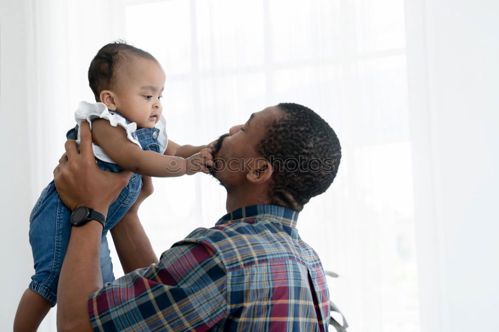 Portrait of African Father and toddler son