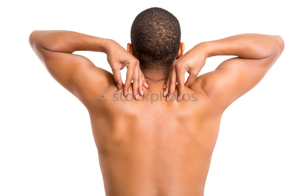 Similar – young woman with very short hair stands naked in front of light turquoise wall in pose with half raised arms