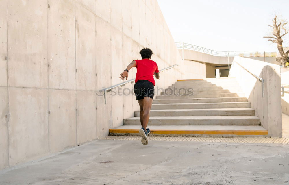 Similar – Image, Stock Photo Black man running upstairs outdoors