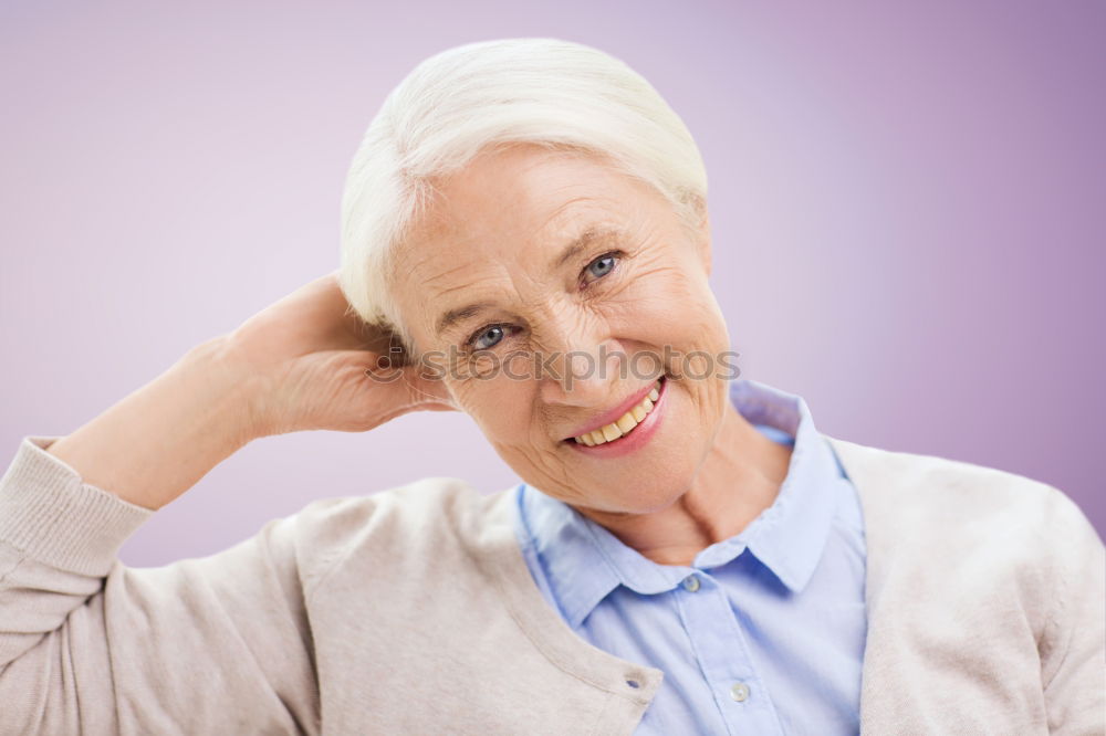 Similar – older woman looking pleased