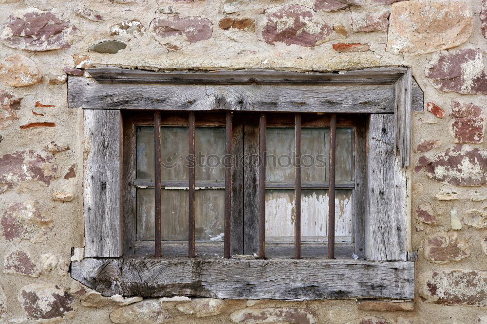 Similar – The what was | window with light blue frame and curtains of a stone house