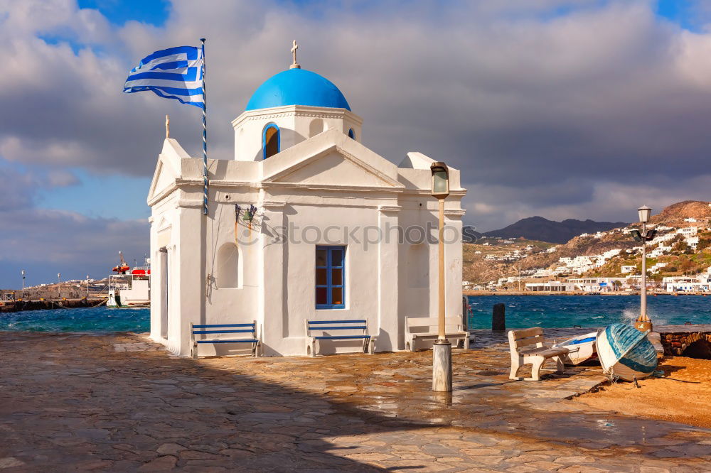 Similar – Image, Stock Photo Greek flag on the beach. Beach houses.