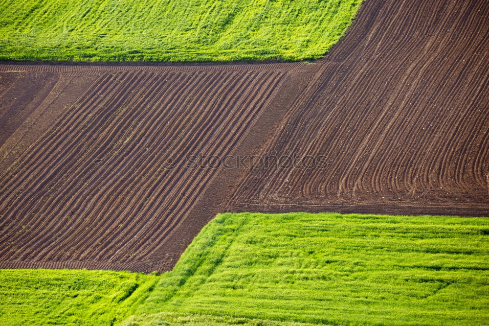 Similar – Wellen in der grünen Landschaft