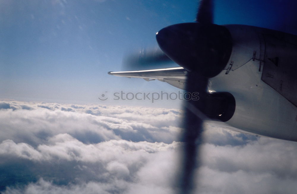 Similar – clouded view Wing Airplane