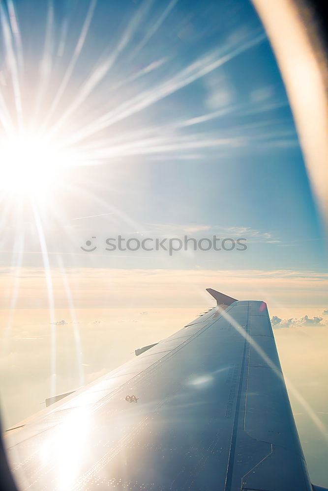 Similar – Aeroplane view into the setting sun