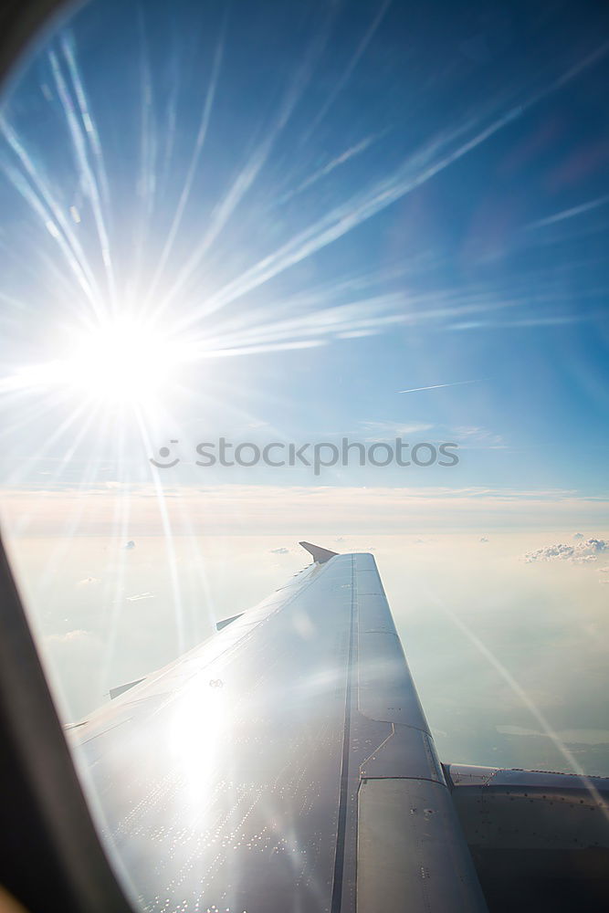 Similar – Aeroplane view into the setting sun