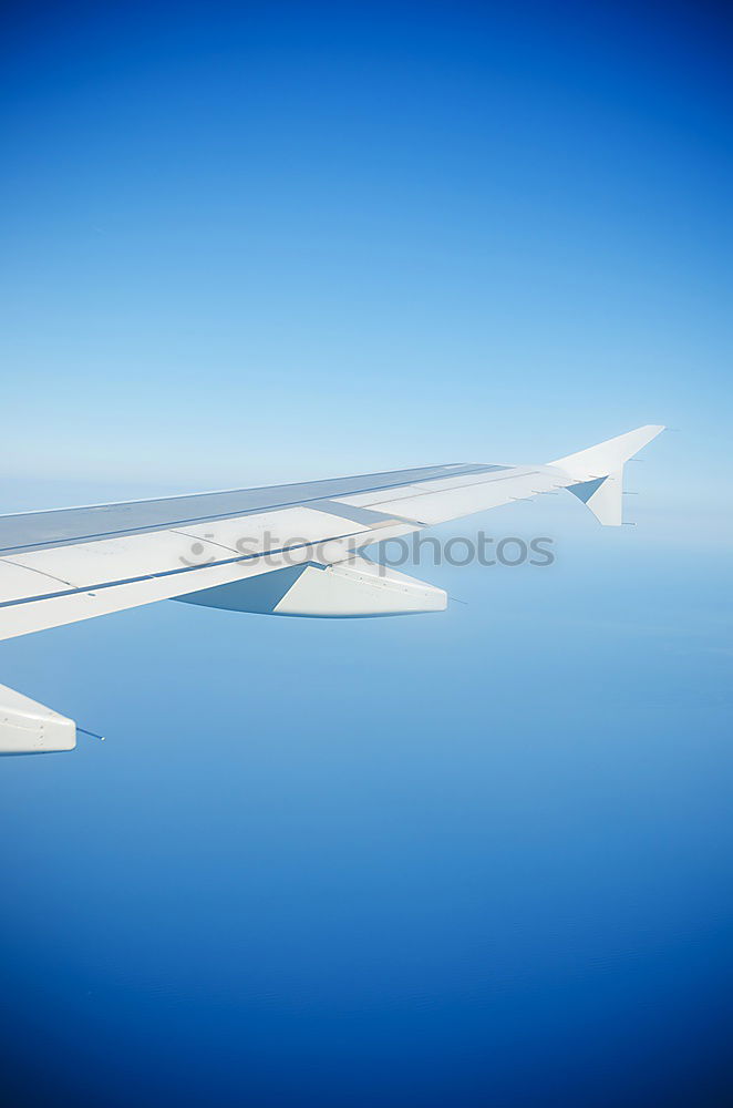 Similar – Foto Bild wing Flugzeug Wolken