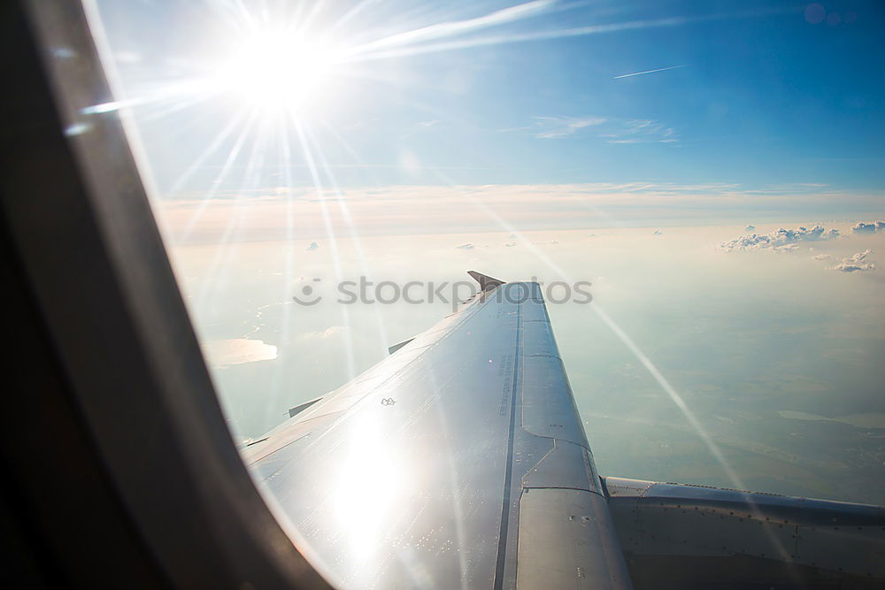 Similar – Aeroplane view into the setting sun