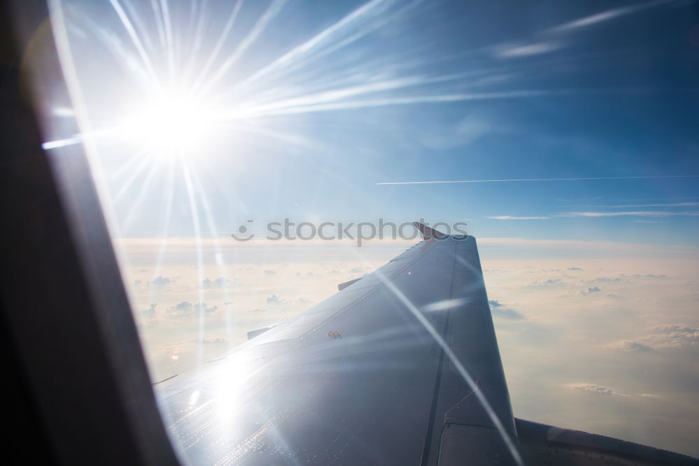 Similar – Aeroplane view into the setting sun