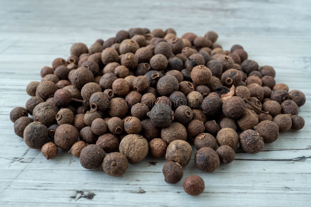 Similar – Image, Stock Photo Macro shot Black peppercorns on a wooden spoon