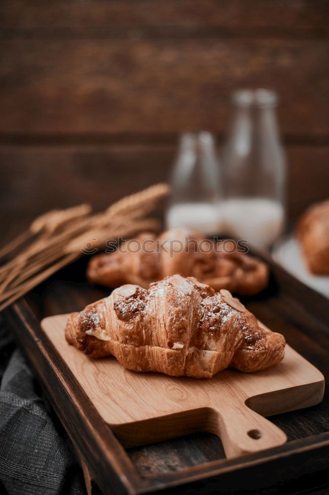 Similar – fresh bread and baked goods on wooden