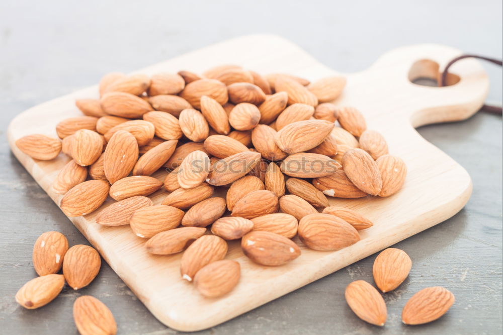 Similar – Image, Stock Photo Almond oil in bottle and nuts