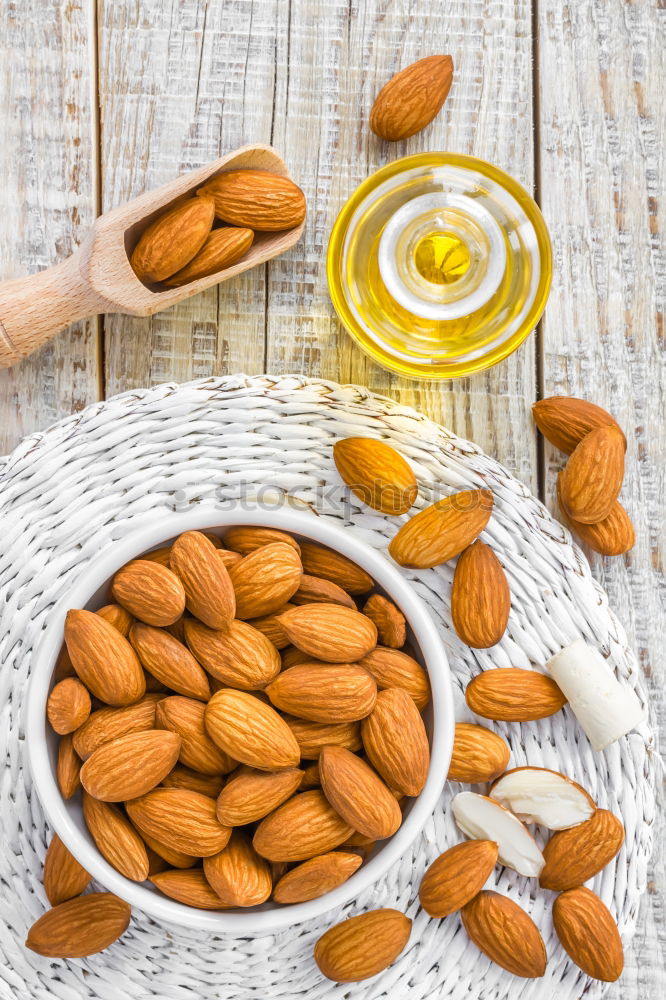 Similar – Image, Stock Photo Almond oil in bottle and nuts