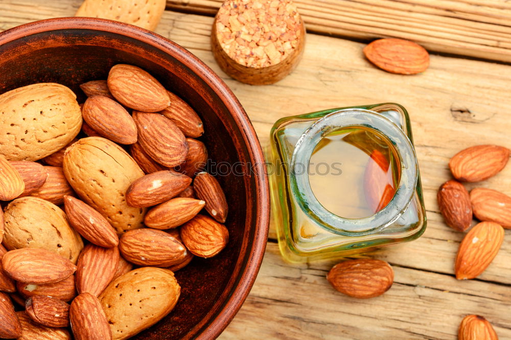 Similar – Image, Stock Photo Almond oil in bottle and nuts