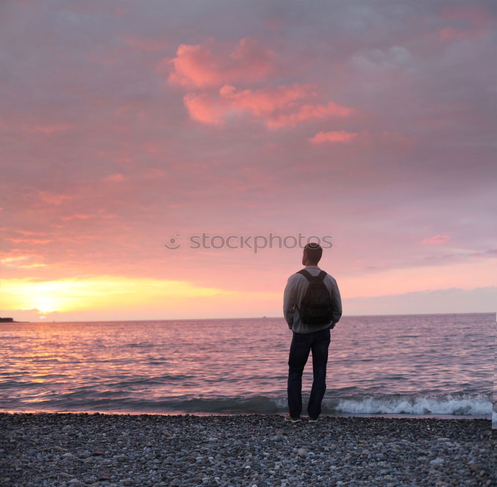 Similar – Image, Stock Photo Man looks into the sunset at the sea