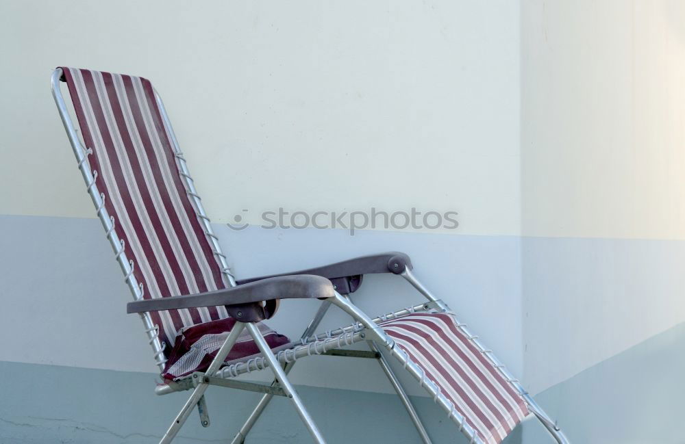 Similar – empty chairs Deckchair