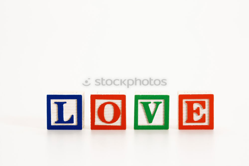 Similar – white wooden background with the word love