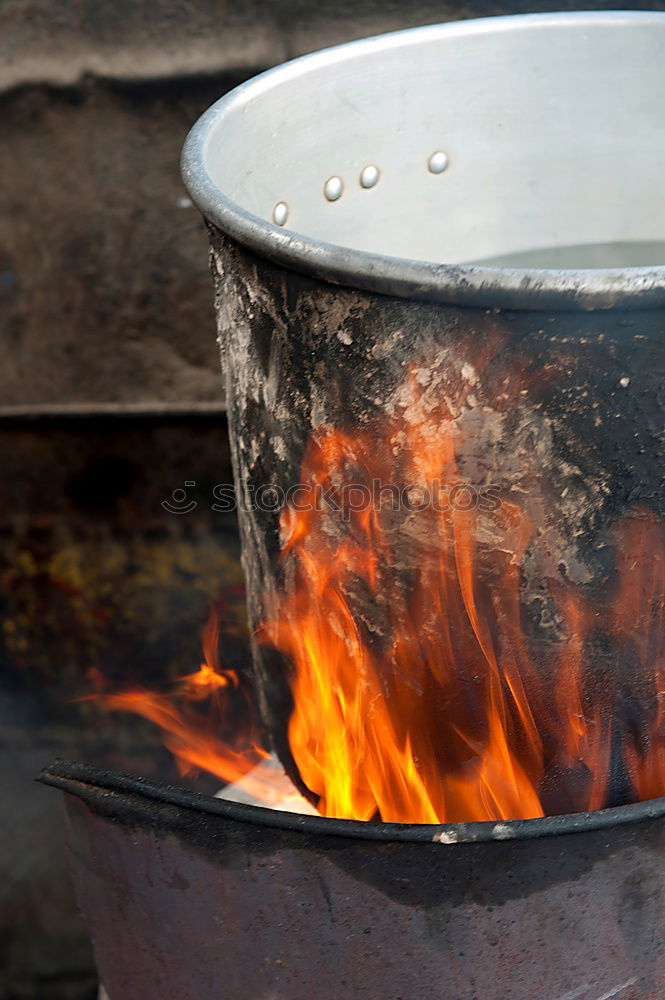 Similar – Hot coals with smoke in grill