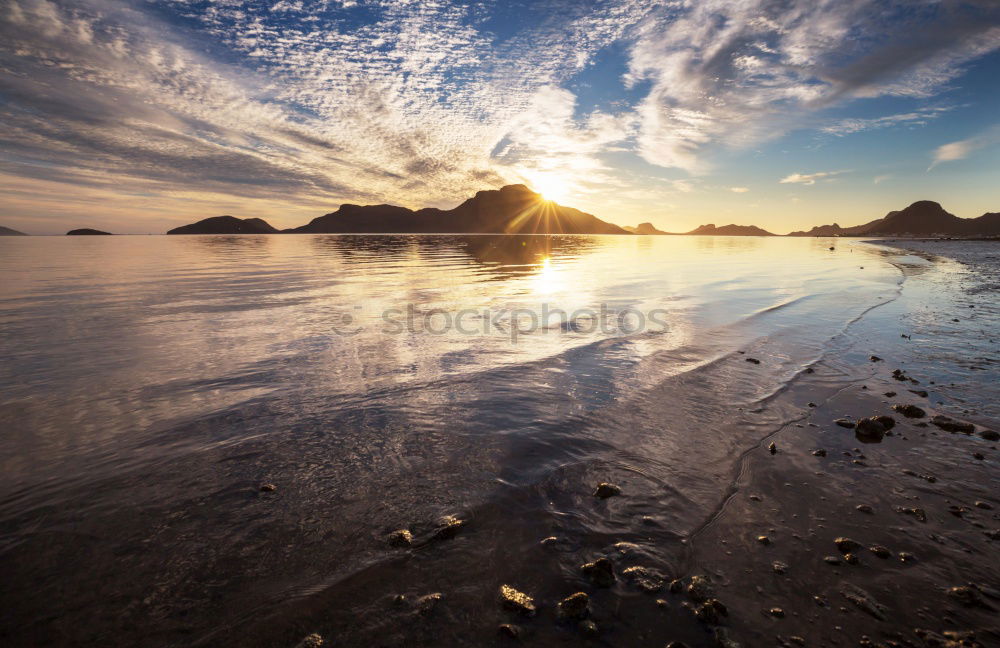 Similar – Image, Stock Photo Liapades Beach, evening atmosphere on a stony beach, waves breaking on a rock behind which the sun is setting