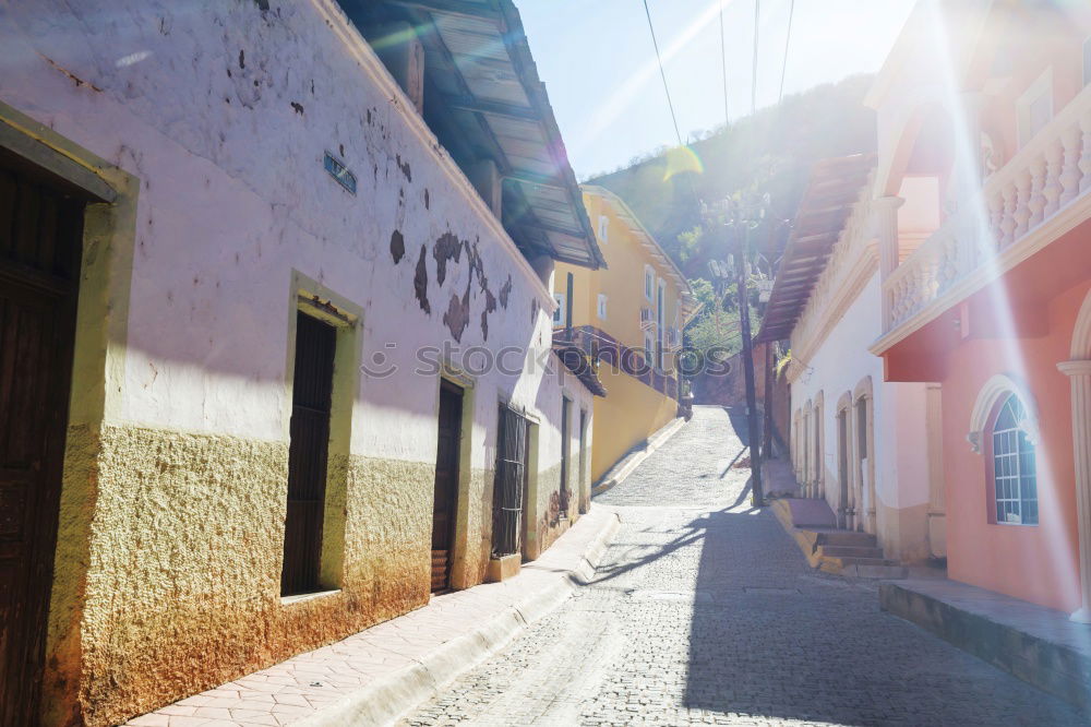 Similar – Image, Stock Photo pretty colorful alleyway in Havana with view to the harbour