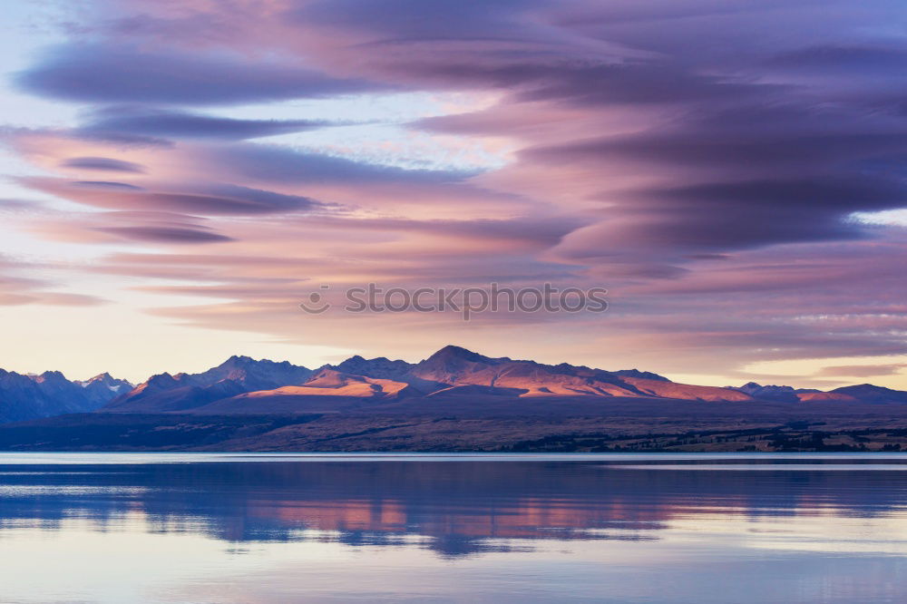 Similar – Song Kul lake with horses in sunrise