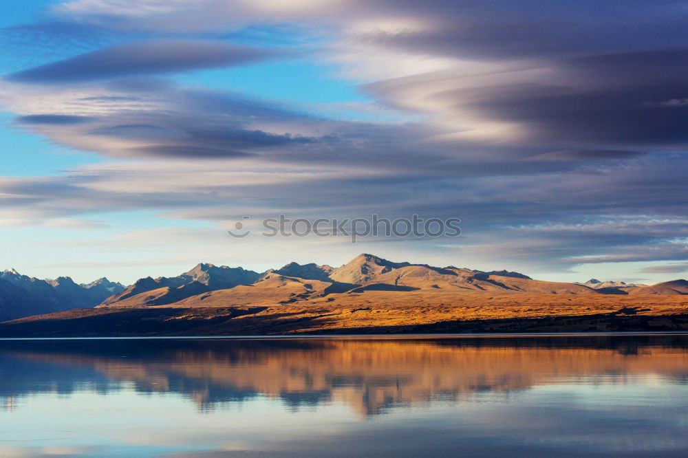 Similar – Song Kul lake with horses in sunrise