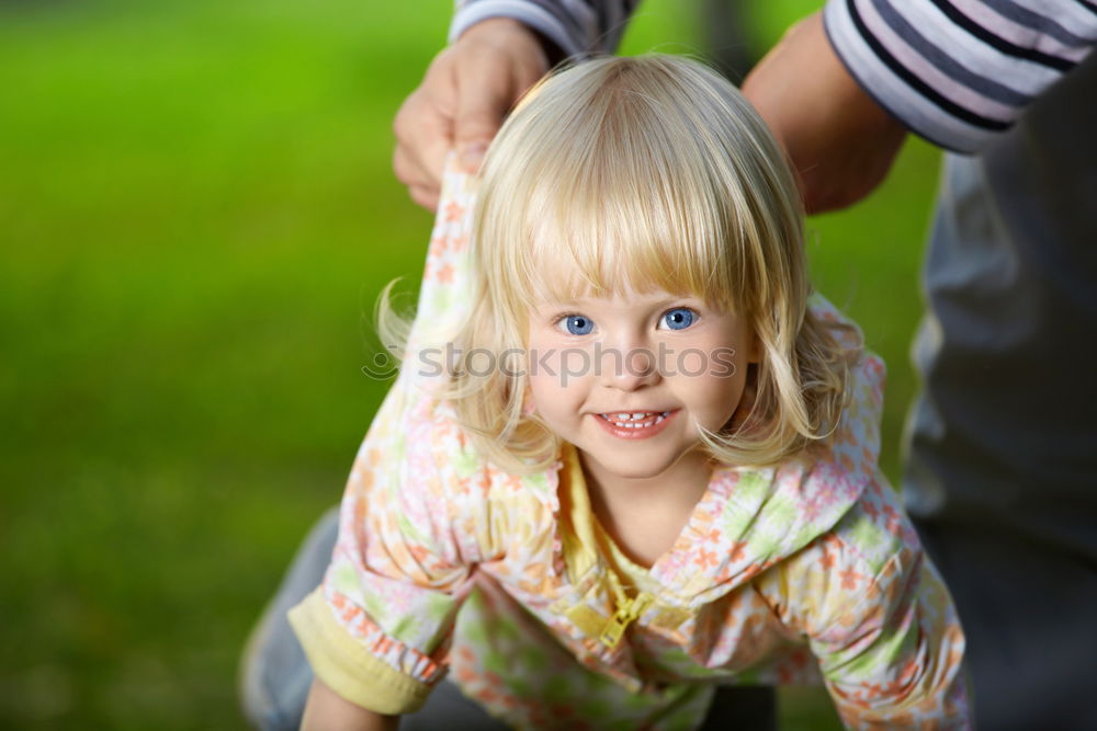 Similar – Image, Stock Photo Cute child on hands of mother
