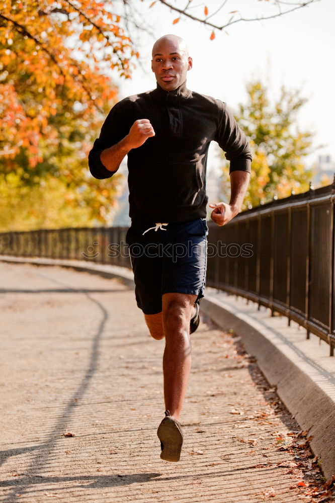 Similar – Senior runner man sitting after jogging in a park