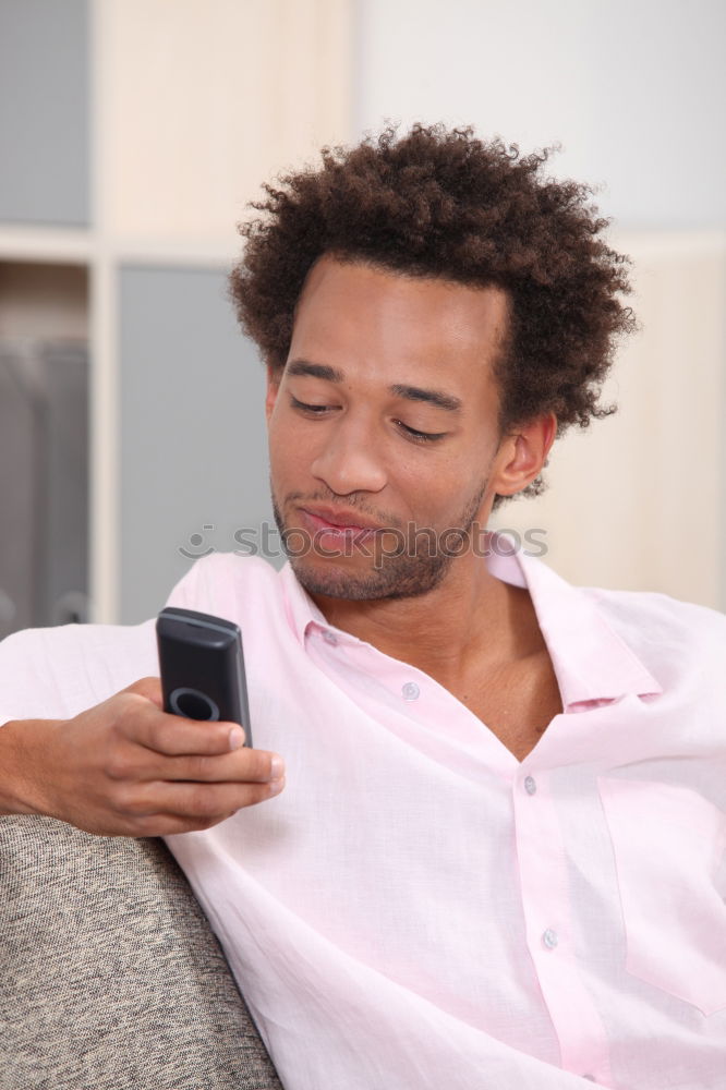 Similar – Image, Stock Photo Portrait of a young thoughtful mixed race man sitting in the sofa