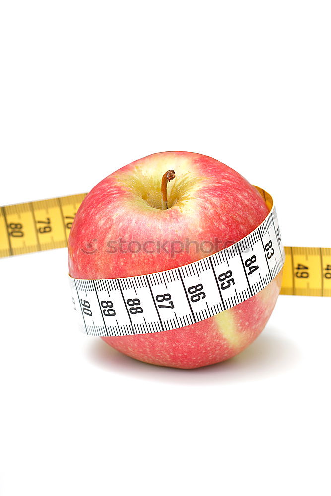 Similar – Red apple with a tape measure