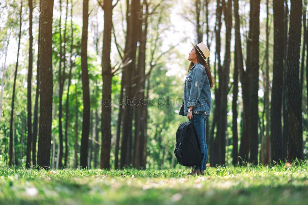 Similar – Woman posing in forest