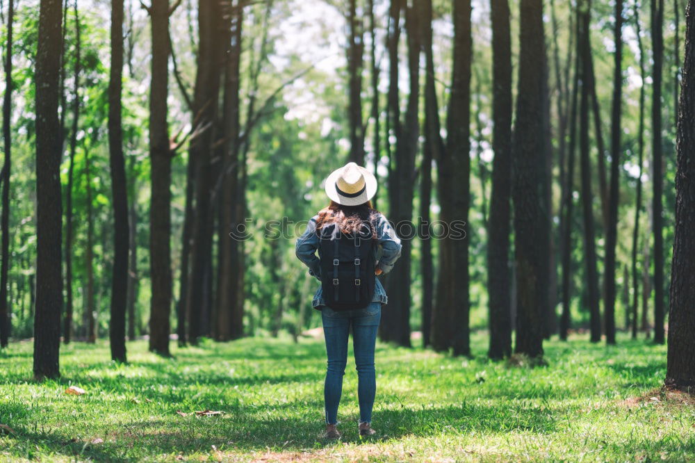 Image, Stock Photo Man navigating on road in woods