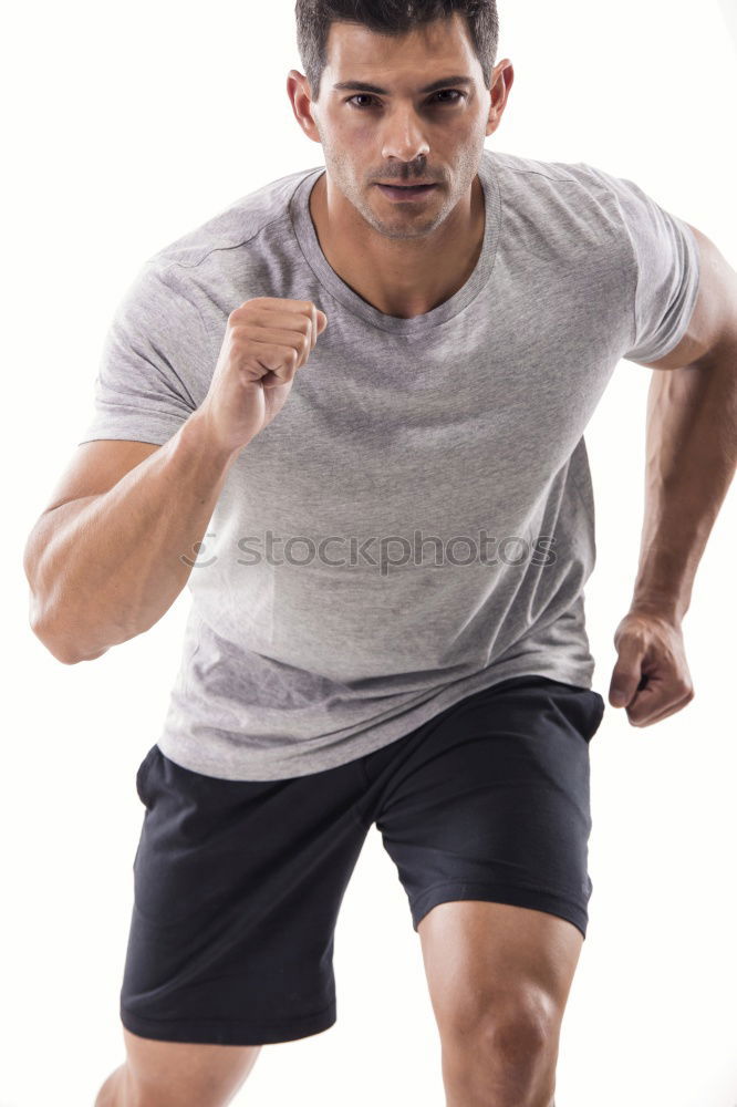 Similar – Black man running and listening to music in urban background