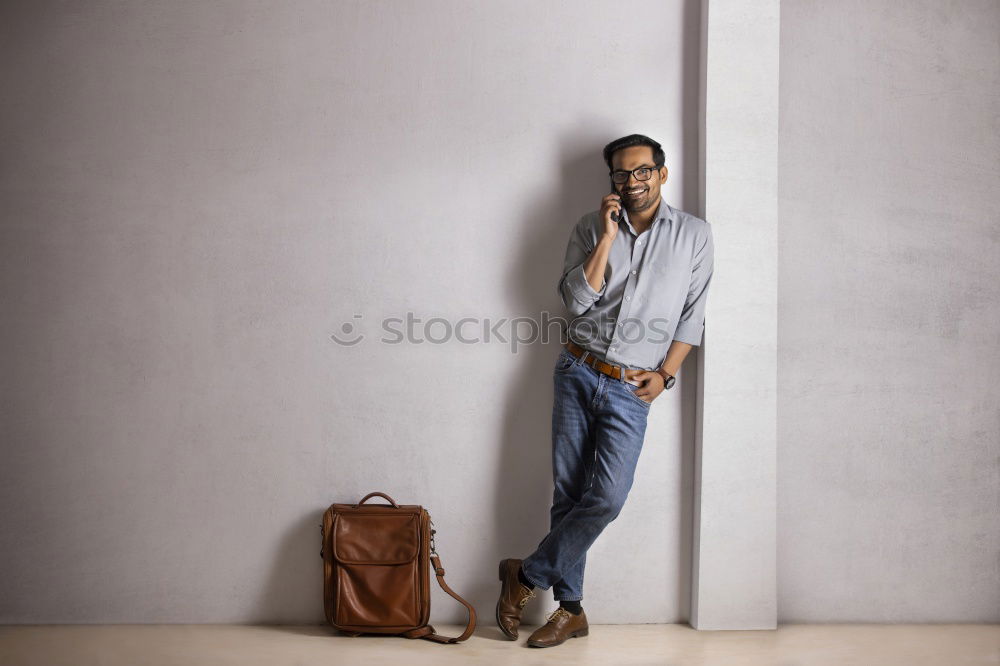 Similar – Image, Stock Photo man sitting at the airport using laptop and mobile phone next to the window