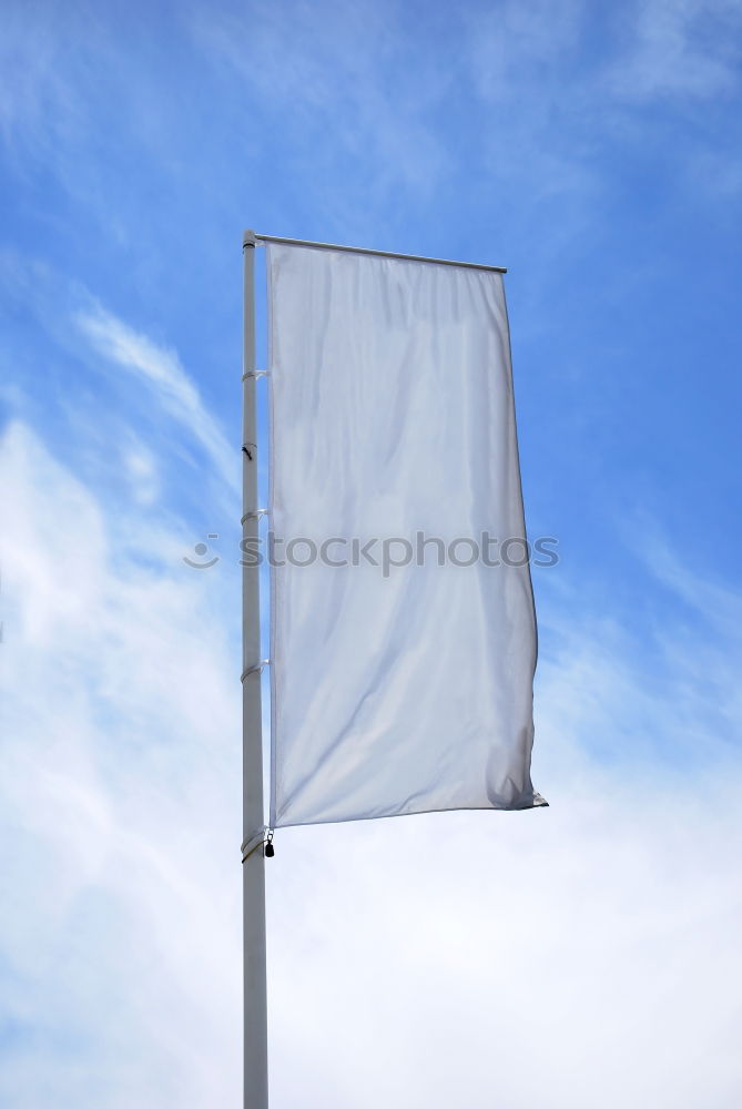 Similar – Hides scaffolding and roof covered with blue plastic tarpaulins Protection from rain