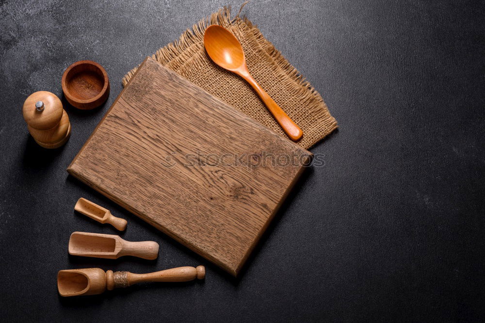 Similar – Cooking Christmas cookies with cookie cutters on a dark table