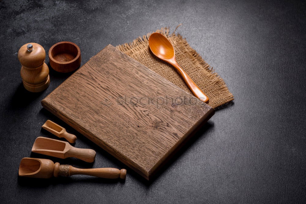 Similar – Cooking Christmas cookies with cookie cutters on a dark table