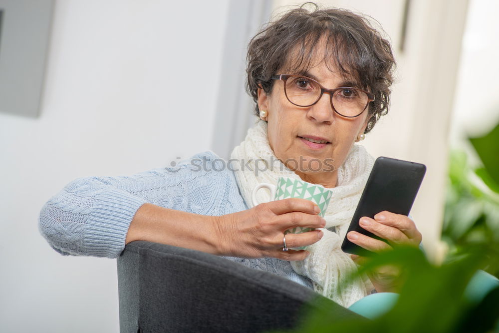 Similar – Image, Stock Photo Happy elderly woman on the mobile phone