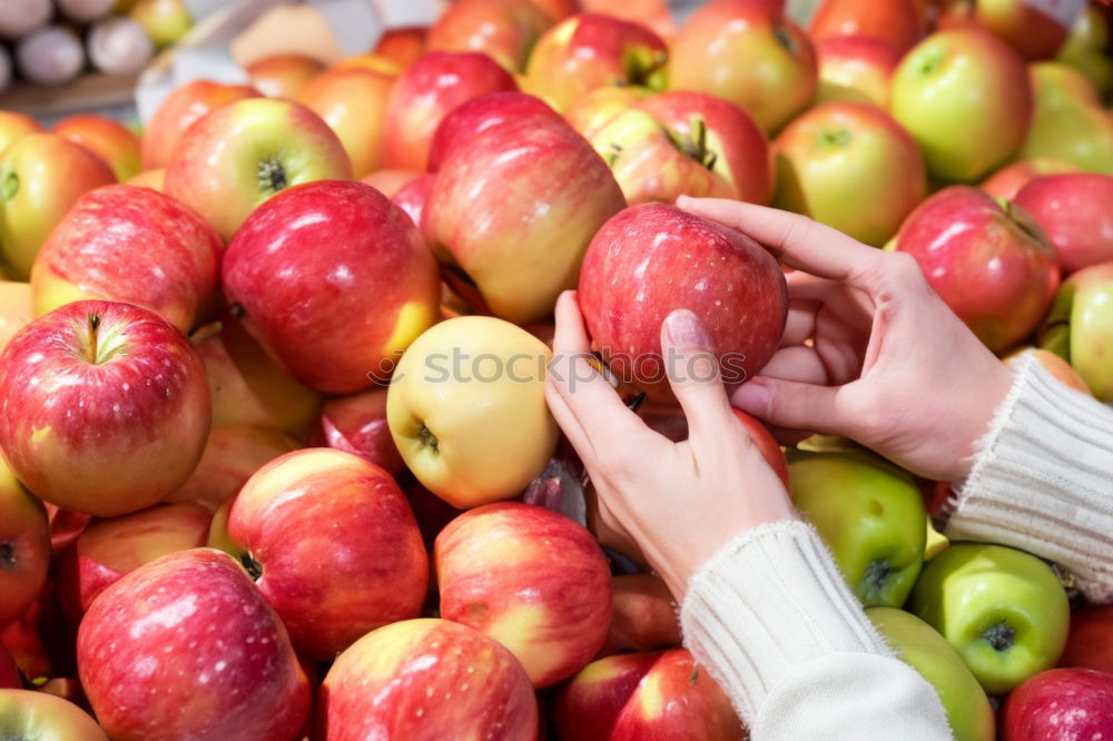 Similar – Image, Stock Photo Beautiful woman choosing apples in supermarket.