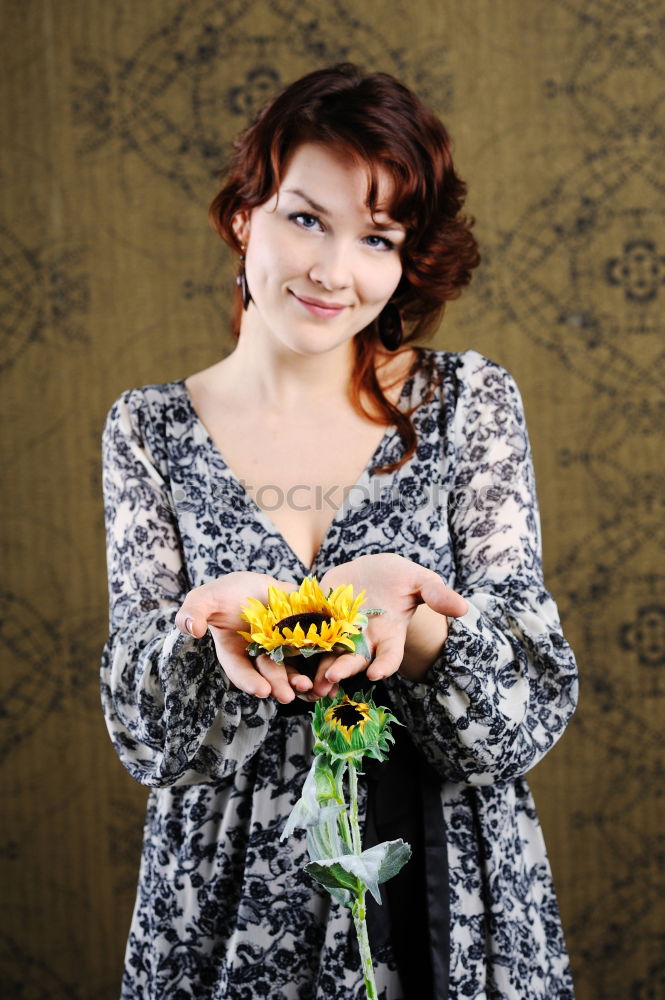 Similar – Portrait of a mature woman sitting on the chair posing thoughtful