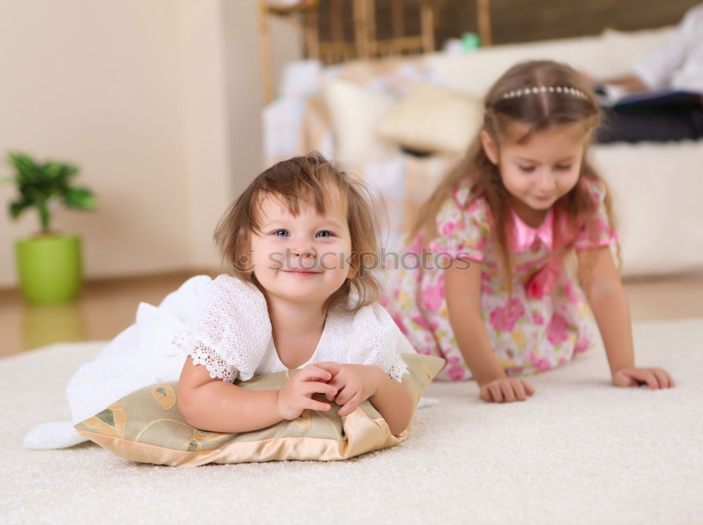 Similar – cute toddler girl put on socks at home