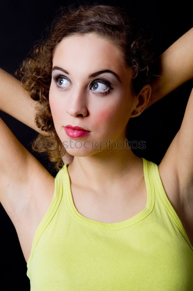 Similar – Girl with blonde hair posing in front of turquoise background